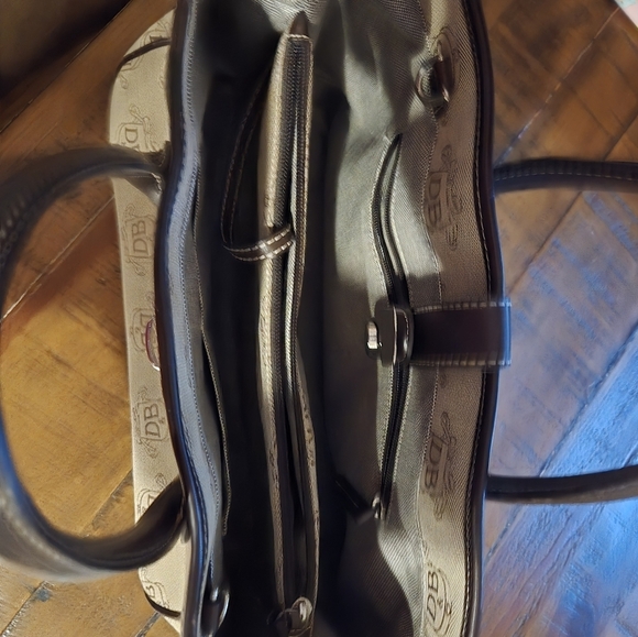 Dooney & Bourke Beige and Black Monogram Handbag. Version K6275437